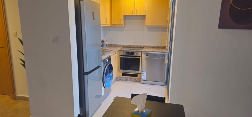 Kitchen or kitchenette, oven