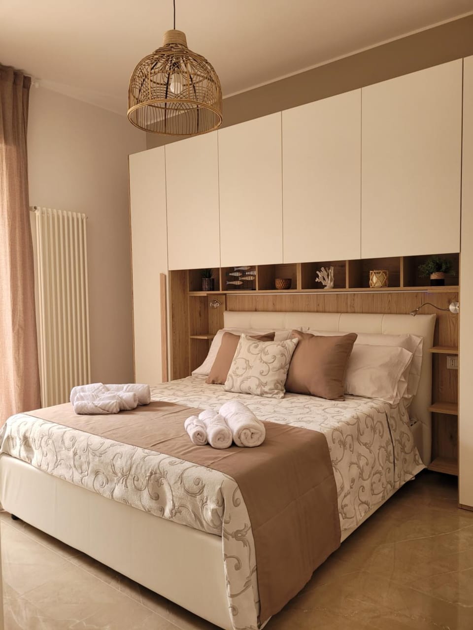 Bed, towels, wardrobe