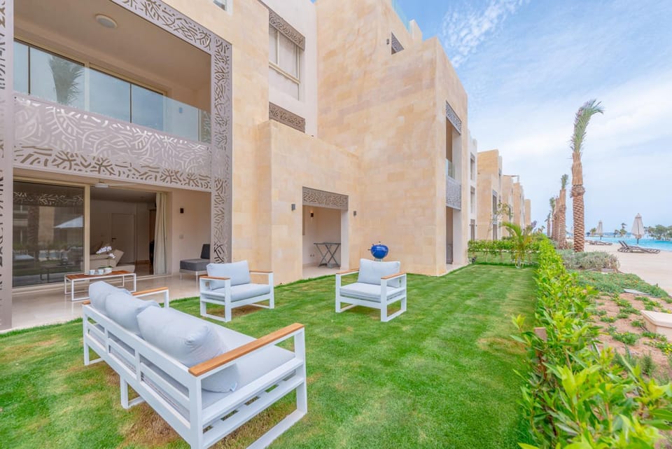 Property building, Patio, Garden, Living room, Seating area, Evening entertainment, Garden view, Pool view, Sea view, Swimming pool