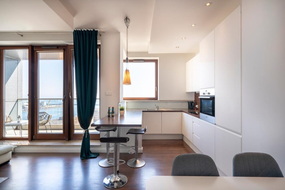 Kitchen or kitchenette, Living room, Seating area, Dining area