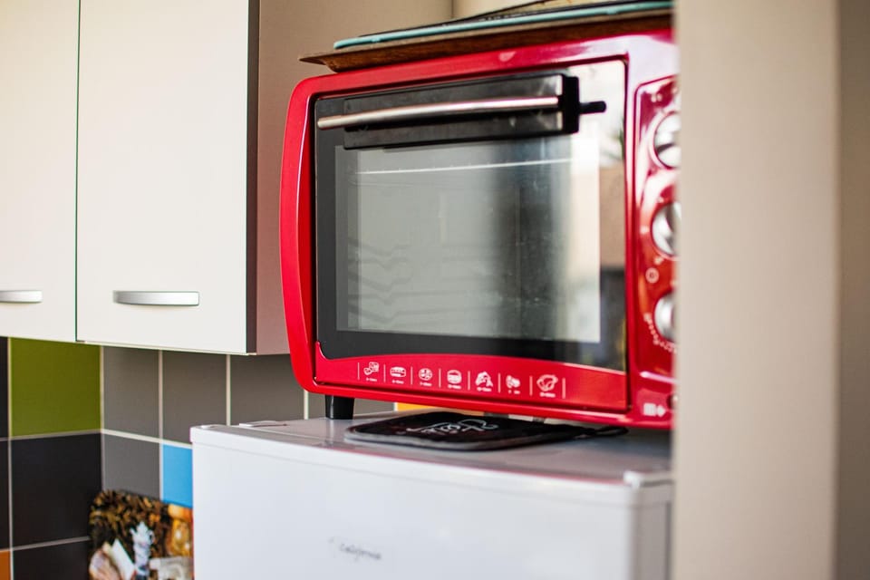 Kitchen or kitchenette, oven