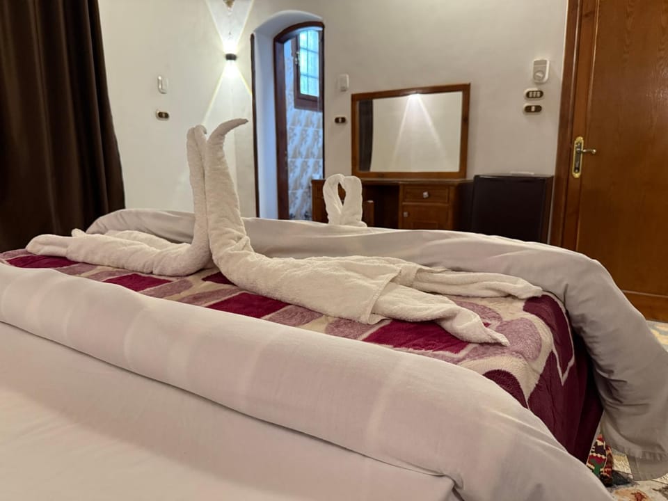 Bed, Photo of the whole room, Bedroom, towels, wardrobe