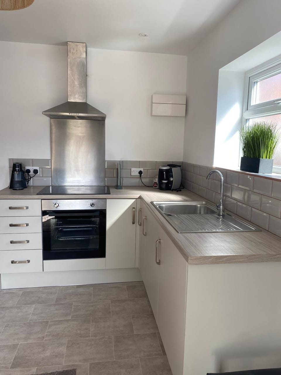 Kitchen or kitchenette, stove