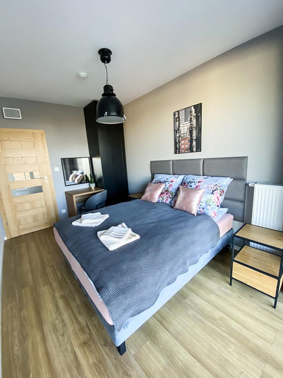 Bed, Photo of the whole room, Seating area, Bedroom, hair dresser, towels, wardrobe