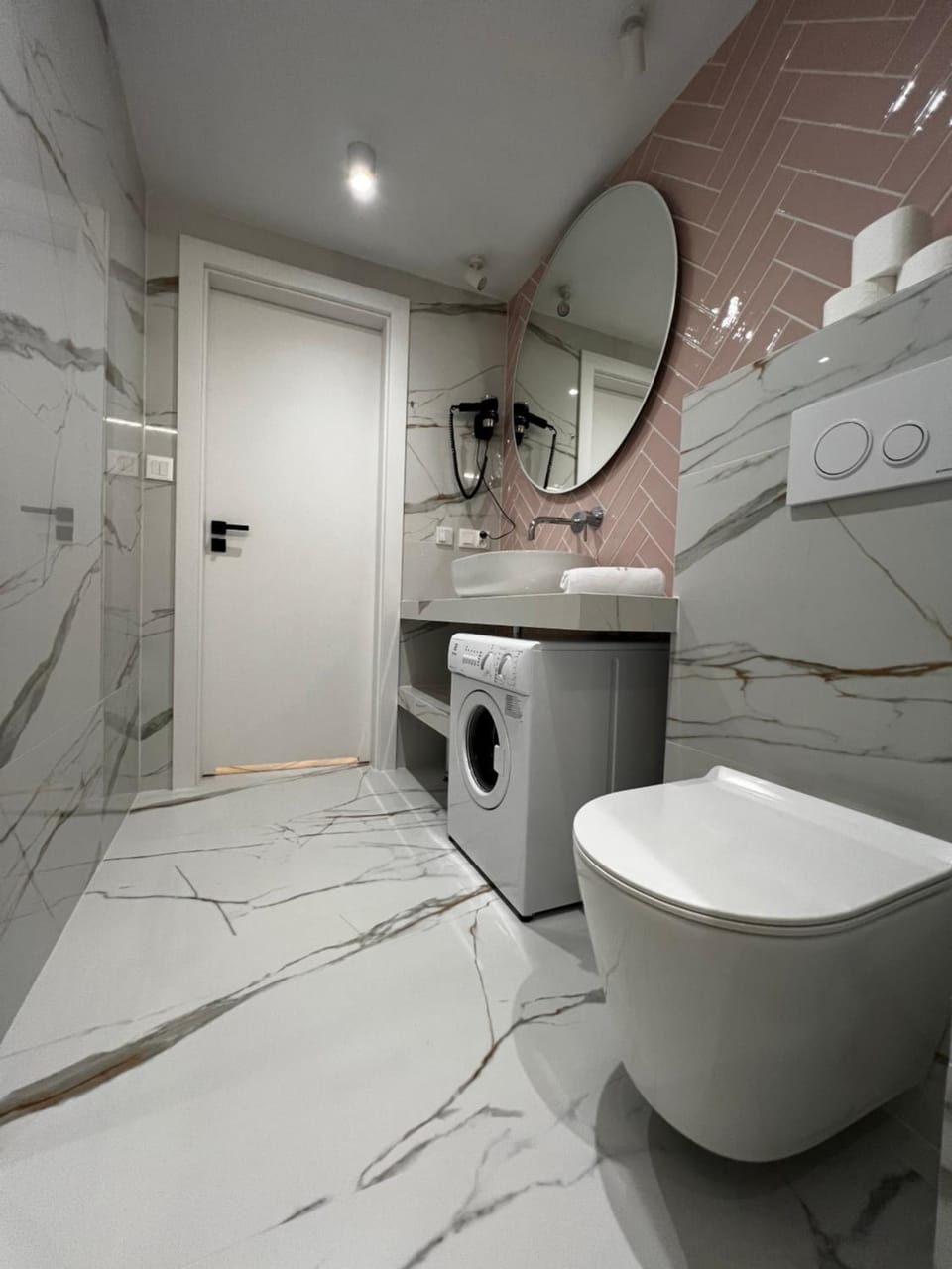 Shower, Toilet, Bathroom, towels, washing machine, dryer