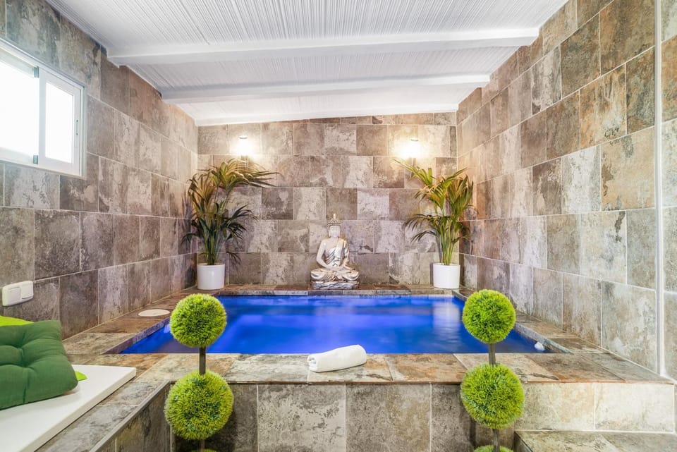 Property building, Living room, Swimming pool