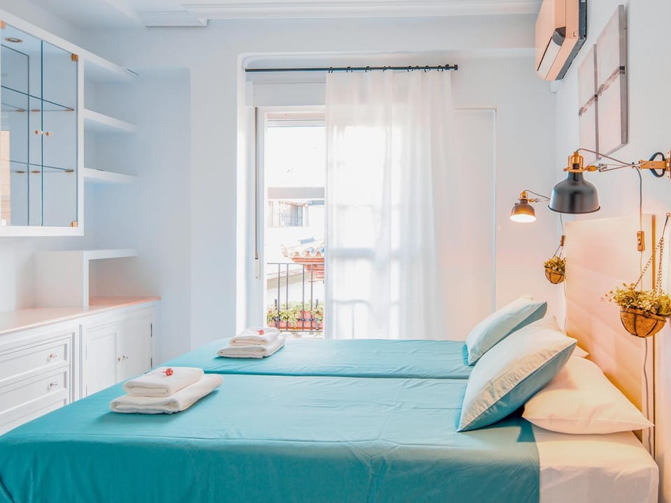 Bed, Photo of the whole room, Bedroom, towels, air conditioner