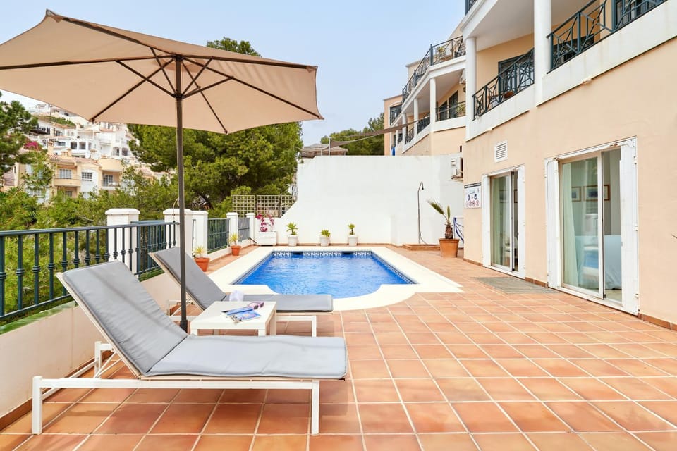 Property building, Living room, Swimming pool