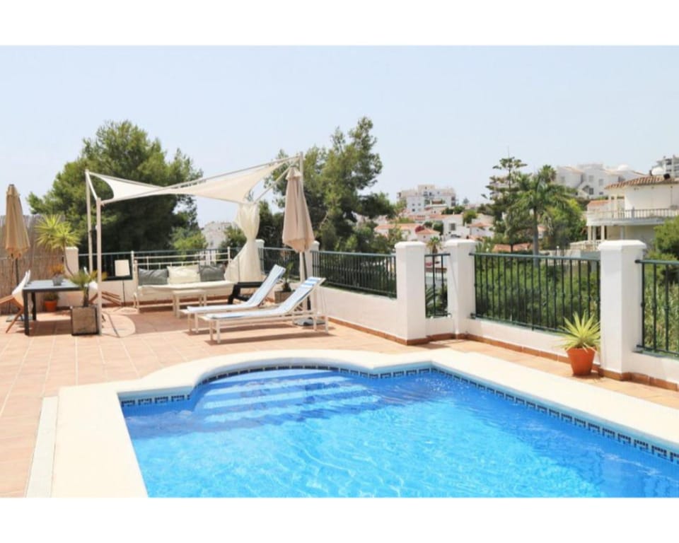 Property building, Living room, Swimming pool