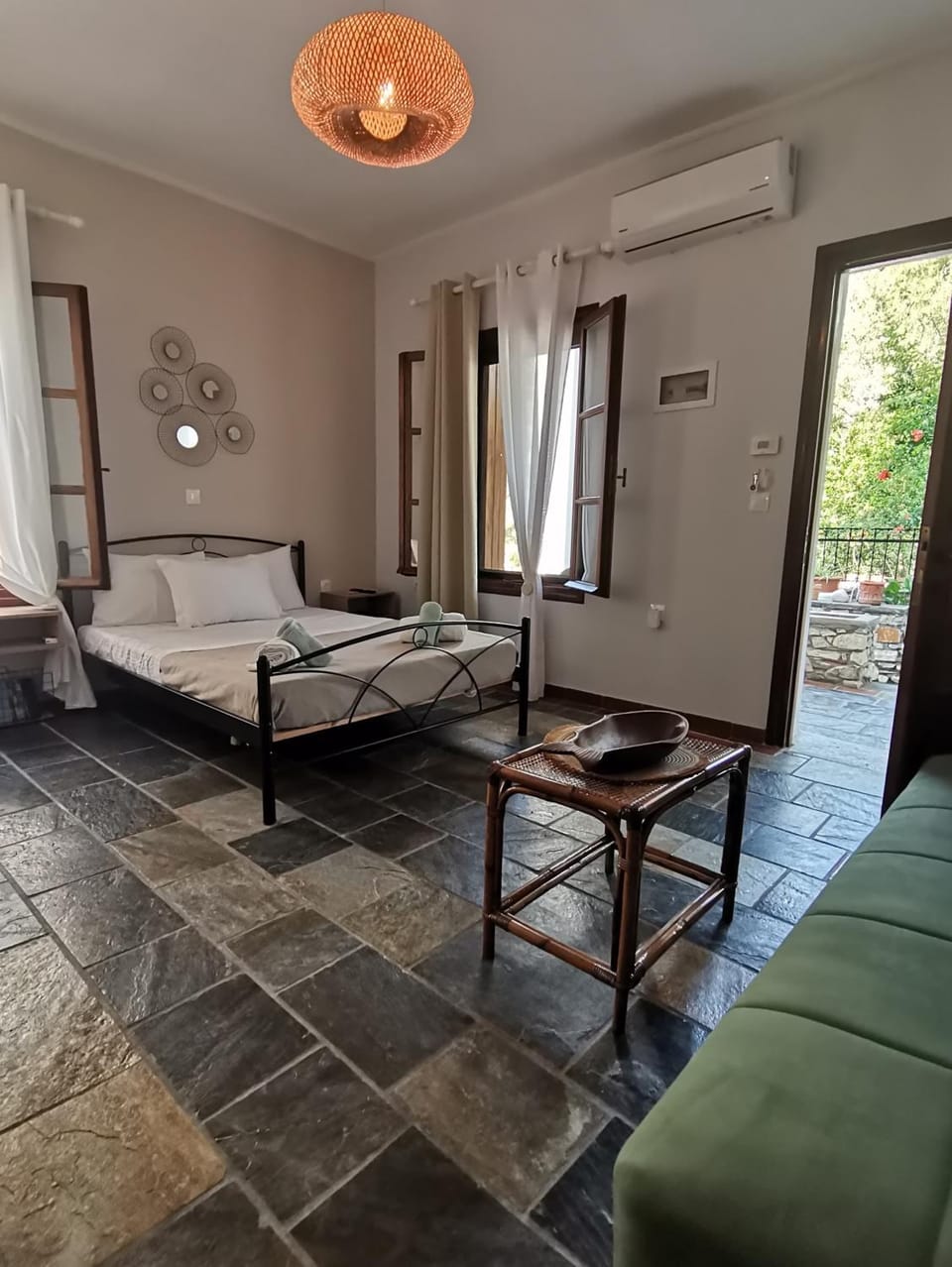 Facade/entrance, Bed, Garden view, air conditioner