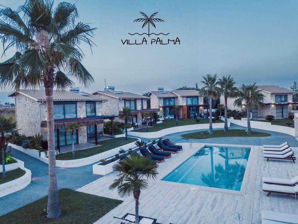 Property building, Natural landscape, Pool view, Swimming pool, sunbed