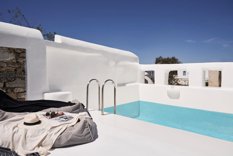 Patio, Day, Natural landscape, Pool view, Swimming pool, sunbed, towels