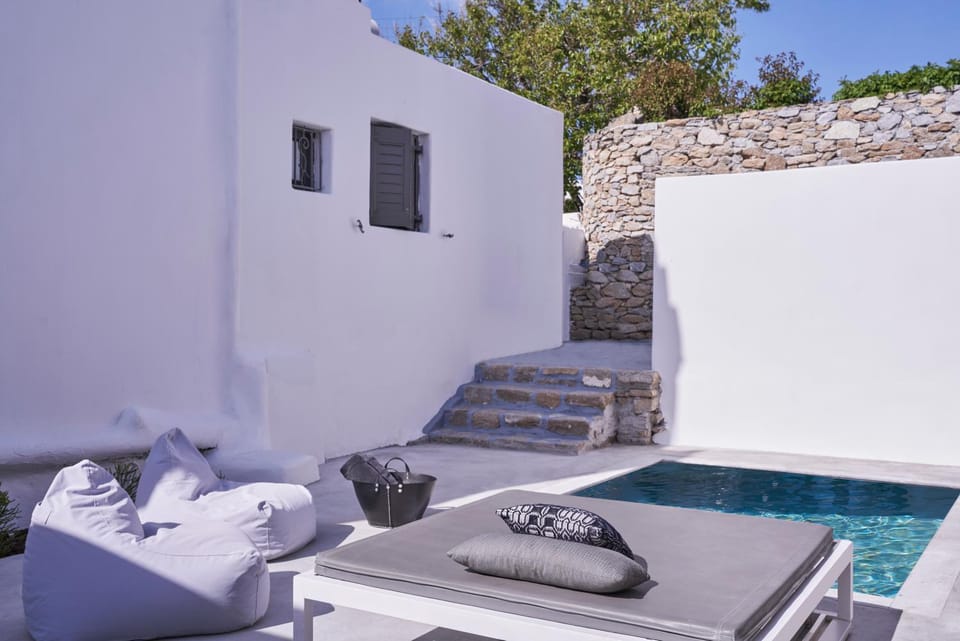 Patio, Day, Natural landscape, Living room, Seating area, Pool view, Swimming pool, sunbed
