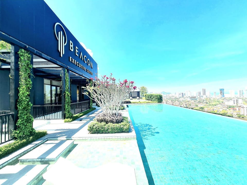 Property building, Day, Property logo or sign, Garden, Garden view, Pool view, Swimming pool