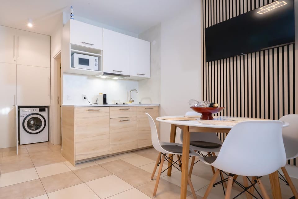 Dining area, dishwasher, microwave, washing machine, kitchen
