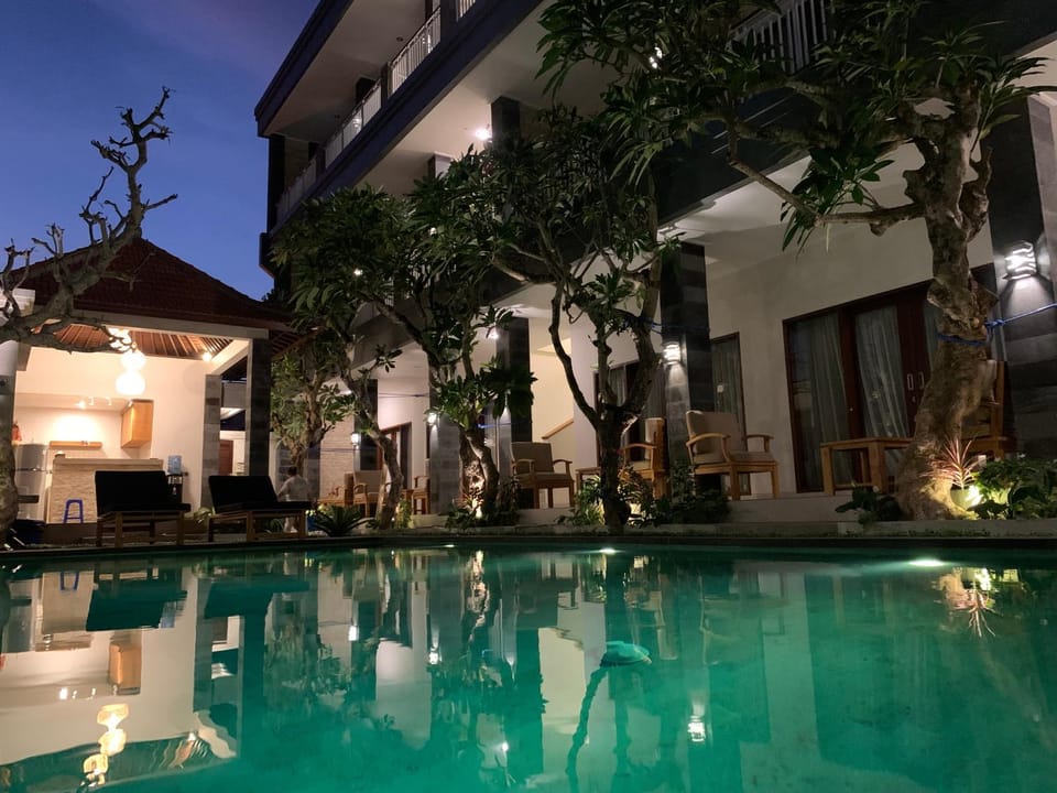 Property building, Patio, Night, Pool view, Swimming pool, sunbed
