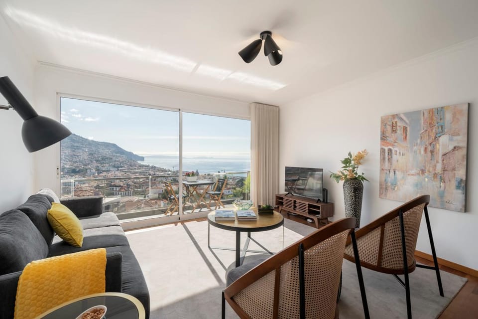 Living room, Seating area, City view, Sea view