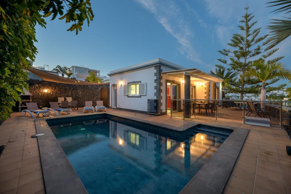 Property building, Living room, Swimming pool