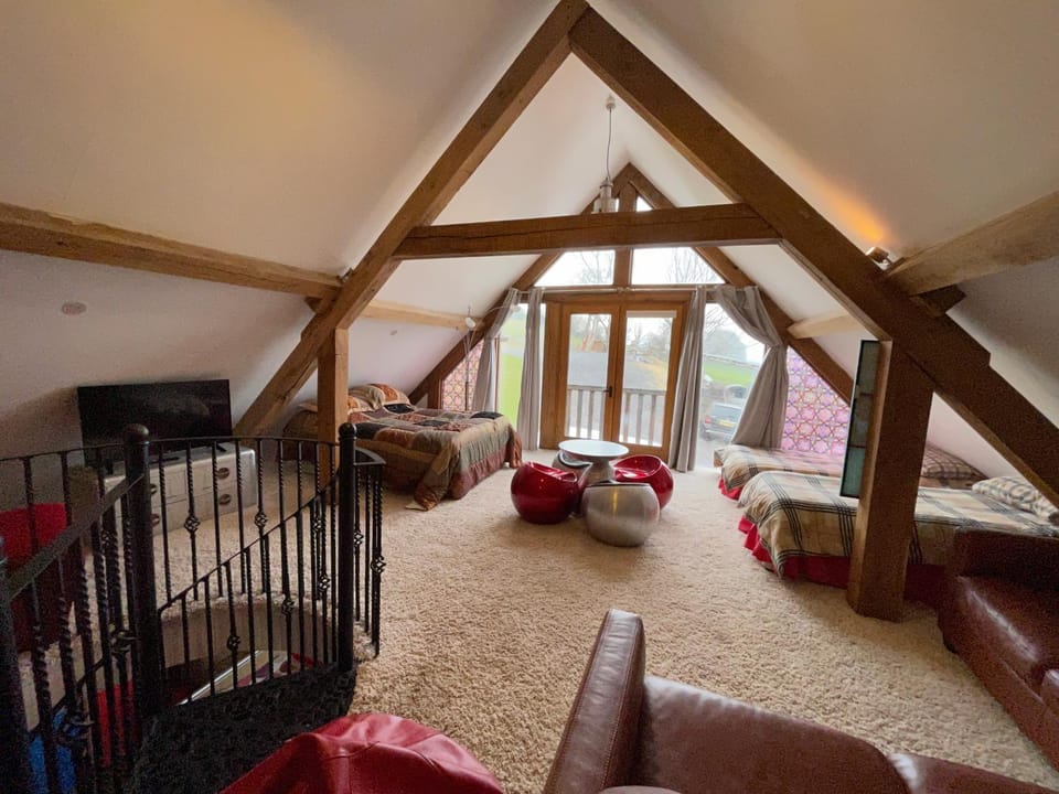 Bed, Seating area, Bedroom