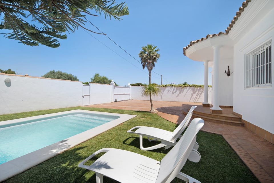 Property building, Living room, Swimming pool