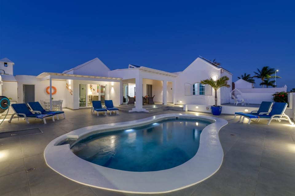 Property building, Living room, Swimming pool