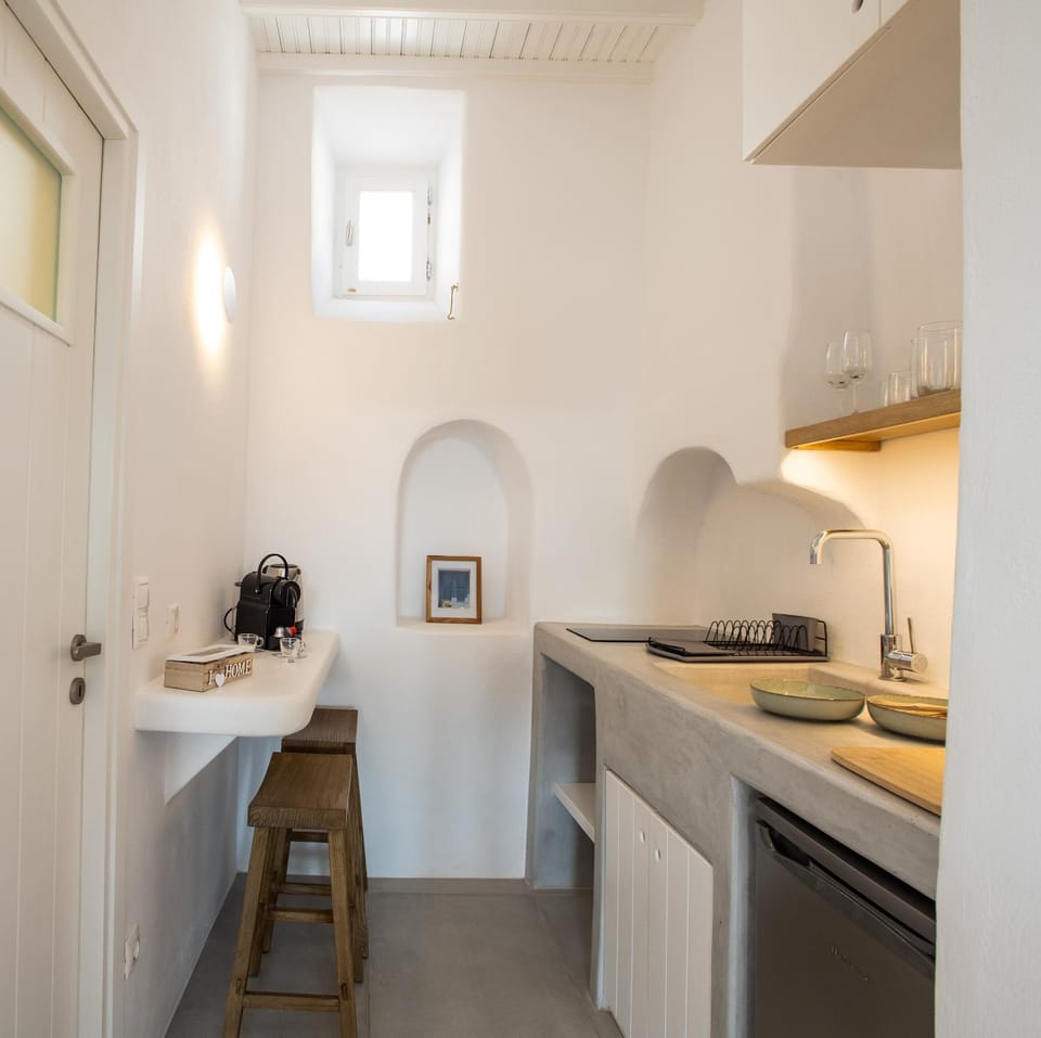 Kitchen or kitchenette, stove, toaster