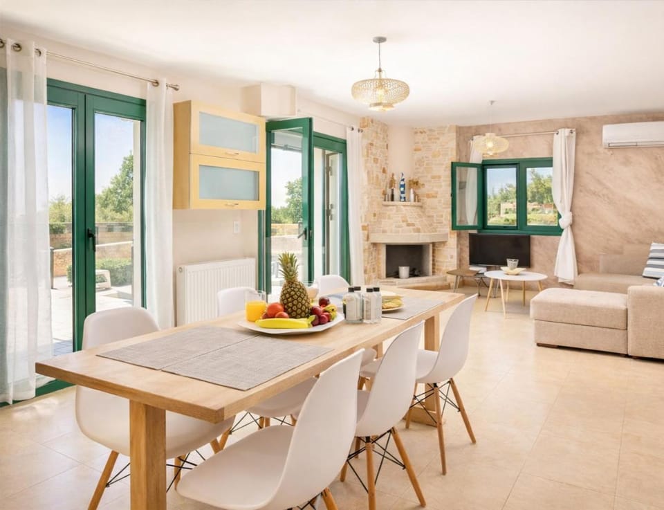 Living room, Seating area, Dining area, Garden view, fireplace