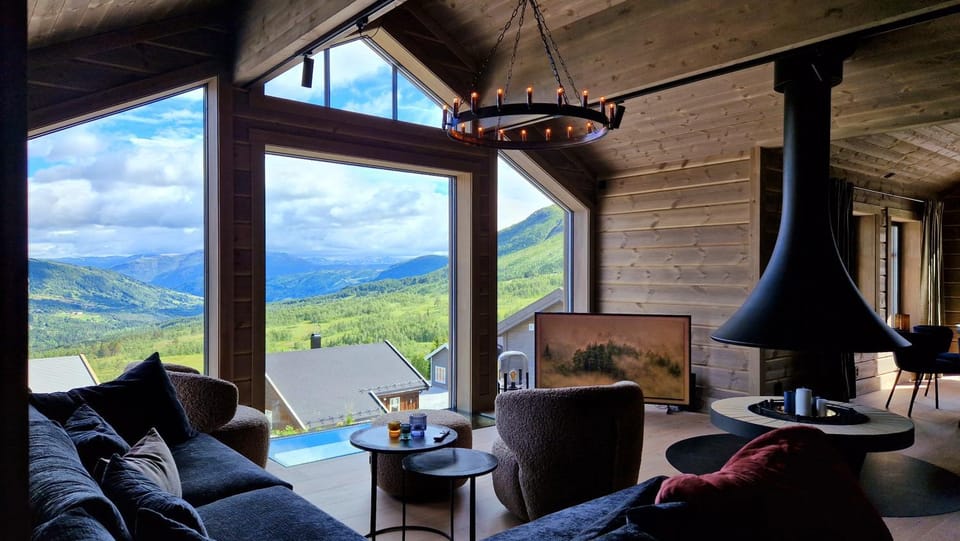 Natural landscape, View (from property/room), Living room, Seating area, Mountain view, flat iron