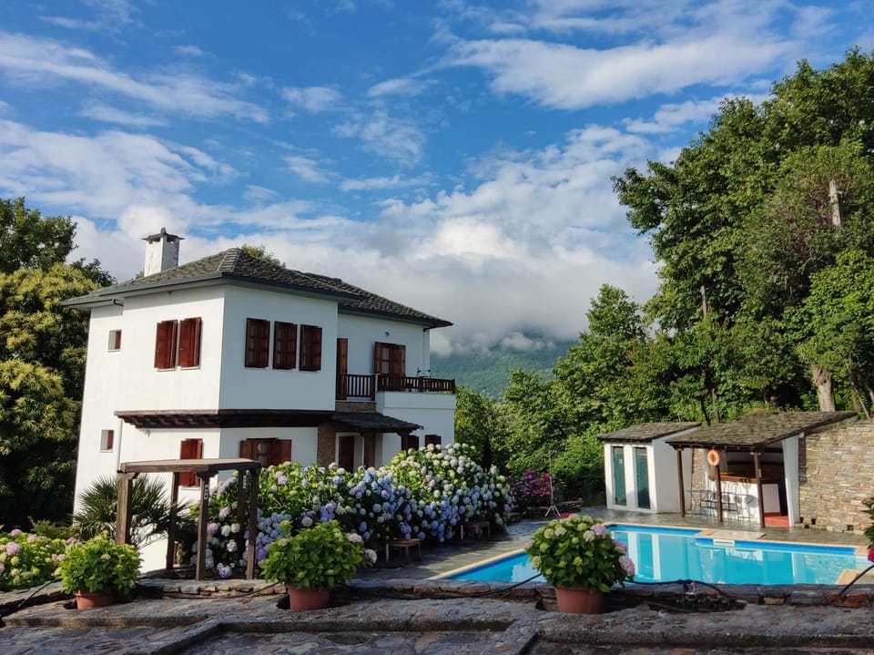 Property building, View (from property/room), Garden view, Mountain view, Pool view, Sea view, Swimming pool