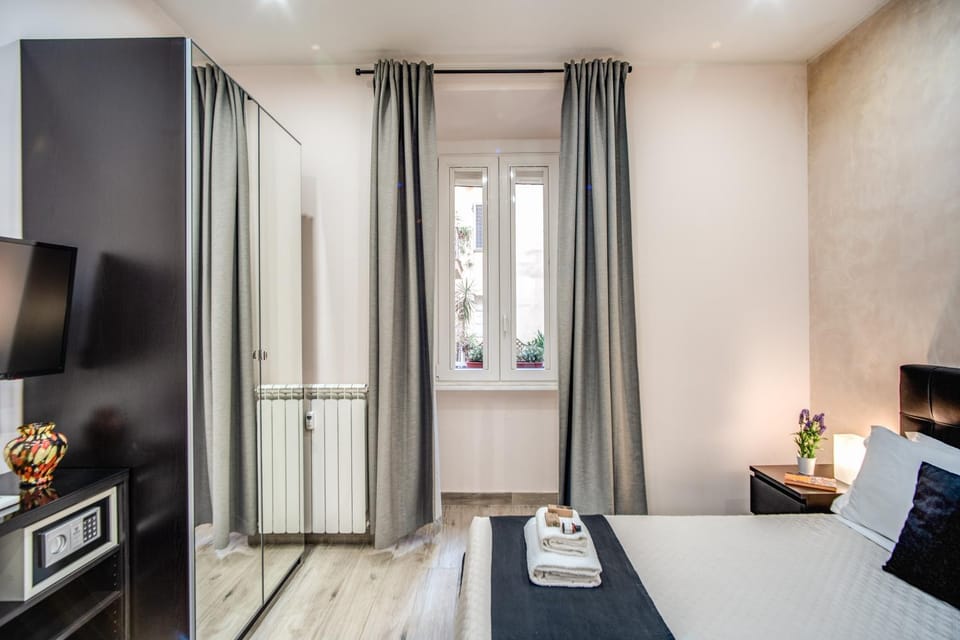Bed, TV and multimedia, Bedroom, towels, wardrobe