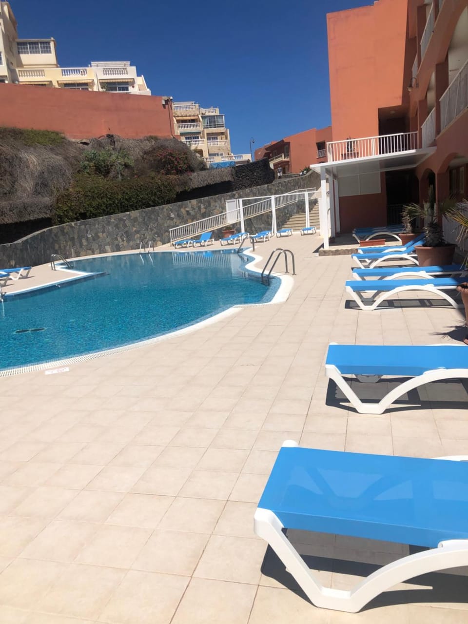 Property building, Day, Pool view, Swimming pool, sunbed