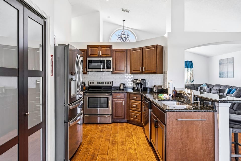 Kitchen or kitchenette, dishwasher, oven, stove, toaster