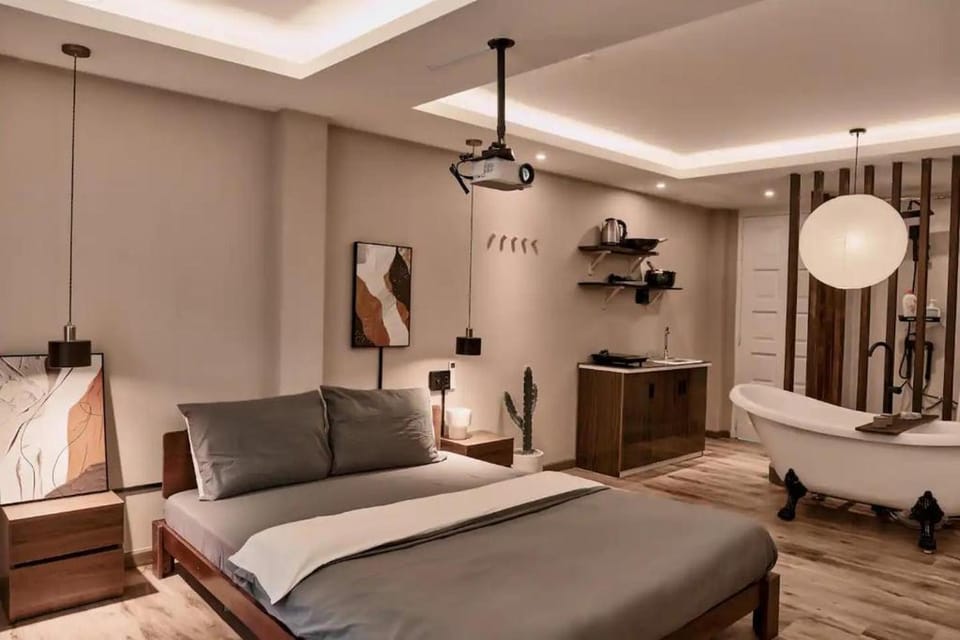 Bed, Bathroom, Living room, Photo of the whole room, Seating area, Bedroom, Bath