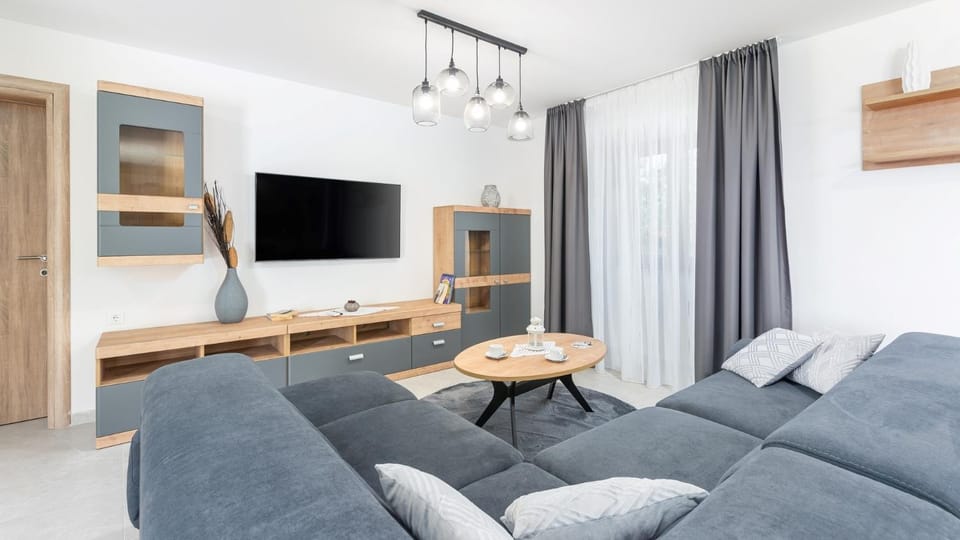 Property building, Living room, Seating area, air conditioner