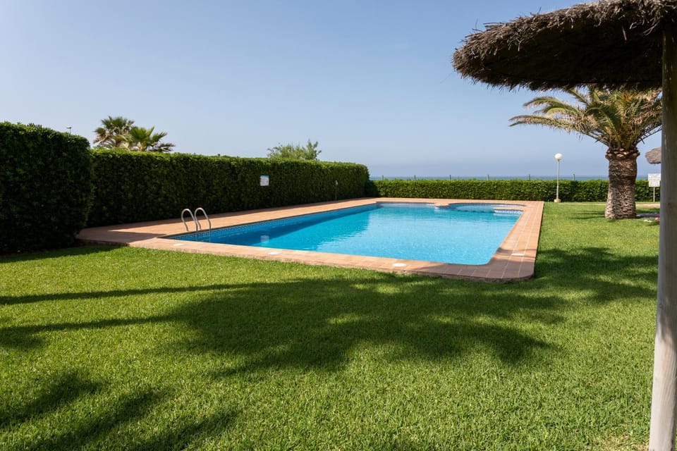 Las Dunas, bajo, 2 dormitorios, 25m del mar, by Bookindenia Apartment in Marina Alta