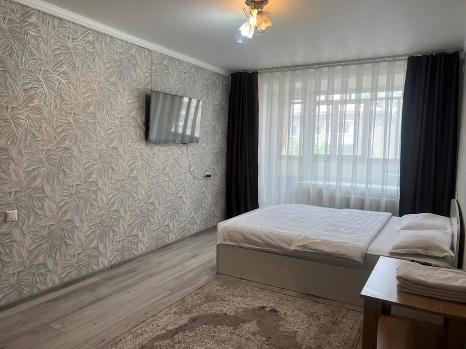 Уютная 1 комнатная квартира в центре города с выходом в центральный парк Apartment in Kazakhstan