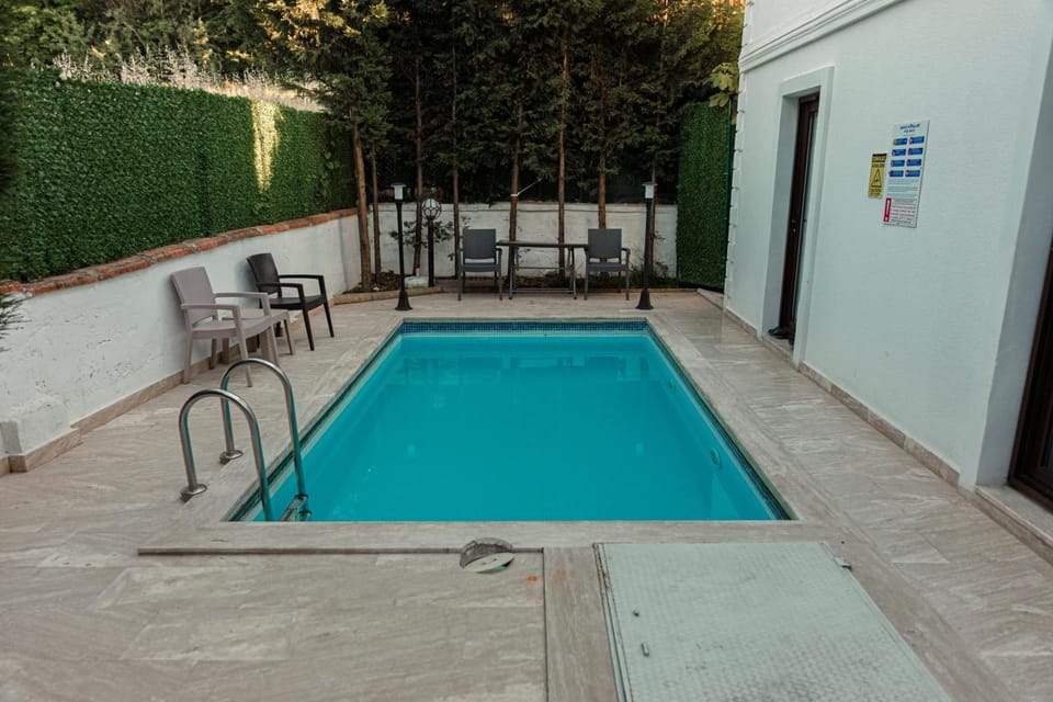Patio, Day, Pool view, Swimming pool, sunbed