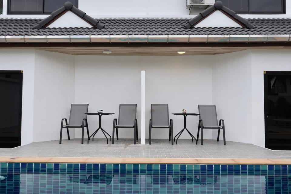 Patio, Day, Living room, Seating area, Pool view, Swimming pool, sunbed