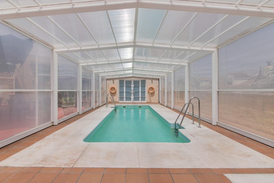 Property building, Living room, Swimming pool