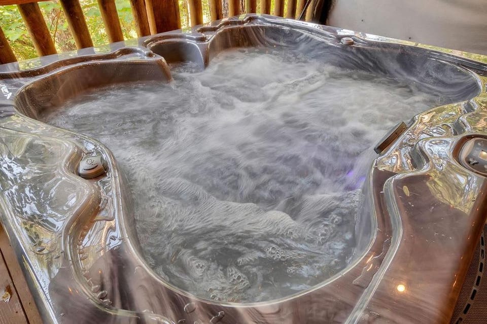 Gorgeous Idyllic Cabin w Hot Tub and Fire Pit Quittin Time is Secluded Romantic Oasis w Luxury Bathroom Double Shower and Bathtub Foosball Table Cabin in Broken Bow