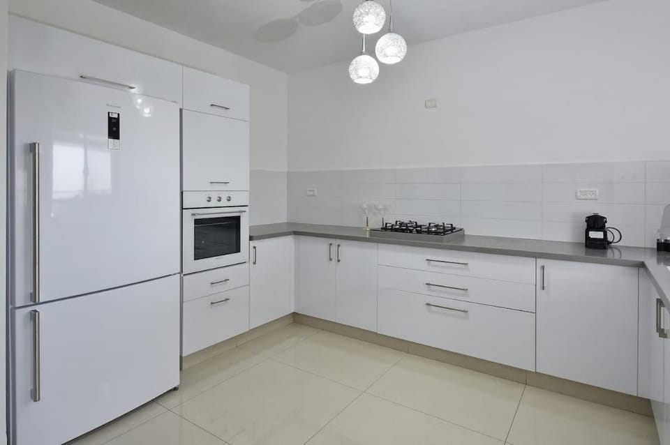 Kitchen or kitchenette, oven, stove