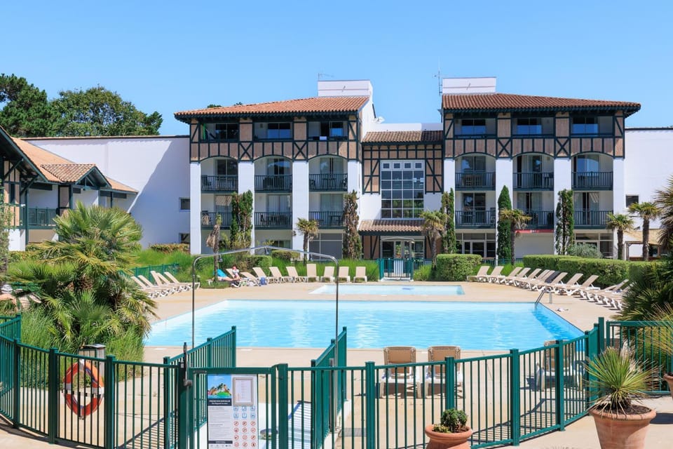 Property building, Living room, Swimming pool