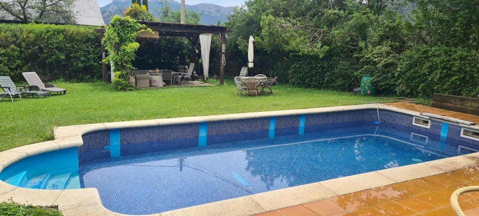 Property building, Living room, Swimming pool