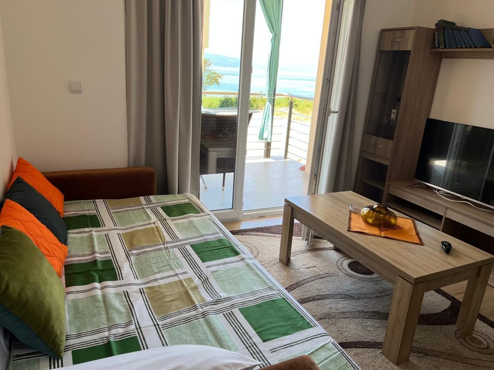 Bed, Living room, Seating area