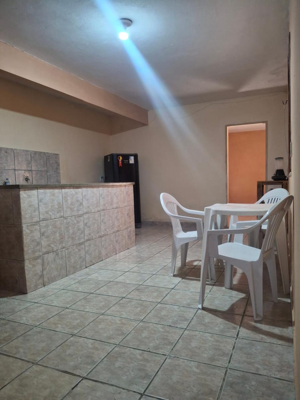 Kitchen or kitchenette, Living room, Seating area, Dining area