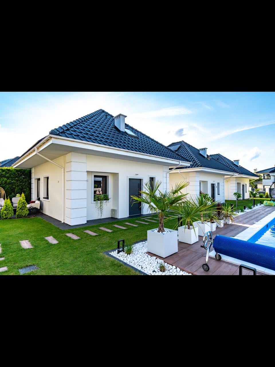 Family Resort Ustka - Domki dwupoziomowe z basenem , sauna , balia House in Pomeranian Voivodeship