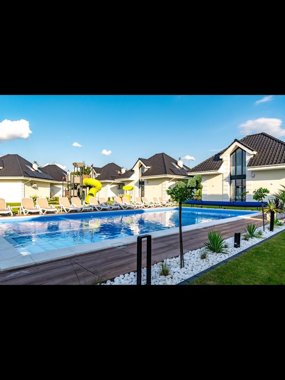Family Resort Ustka - Domki dwupoziomowe z basenem , sauna , balia House in Pomeranian Voivodeship