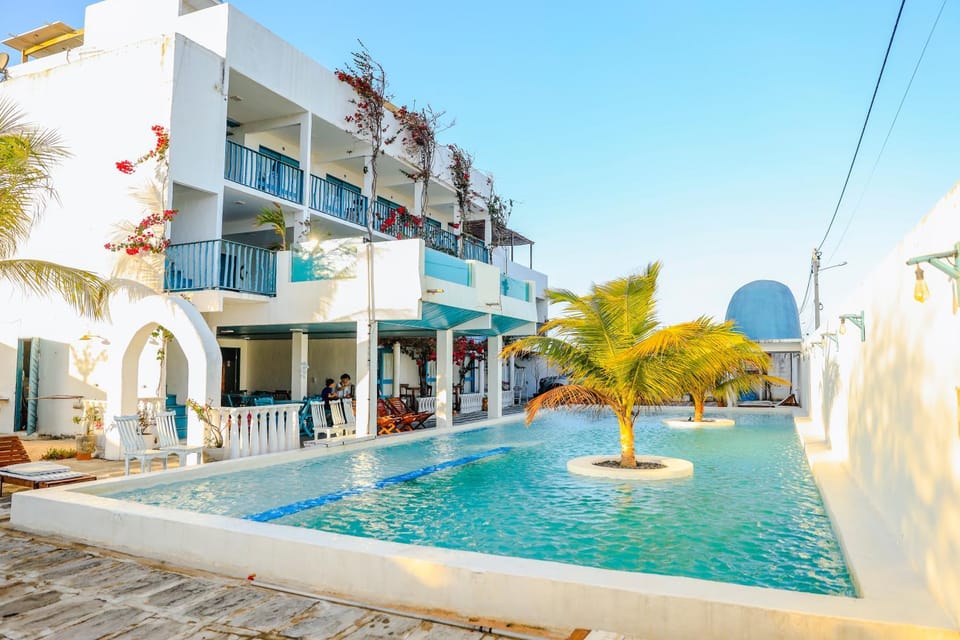 Property building, Pool view, Swimming pool, sunbed