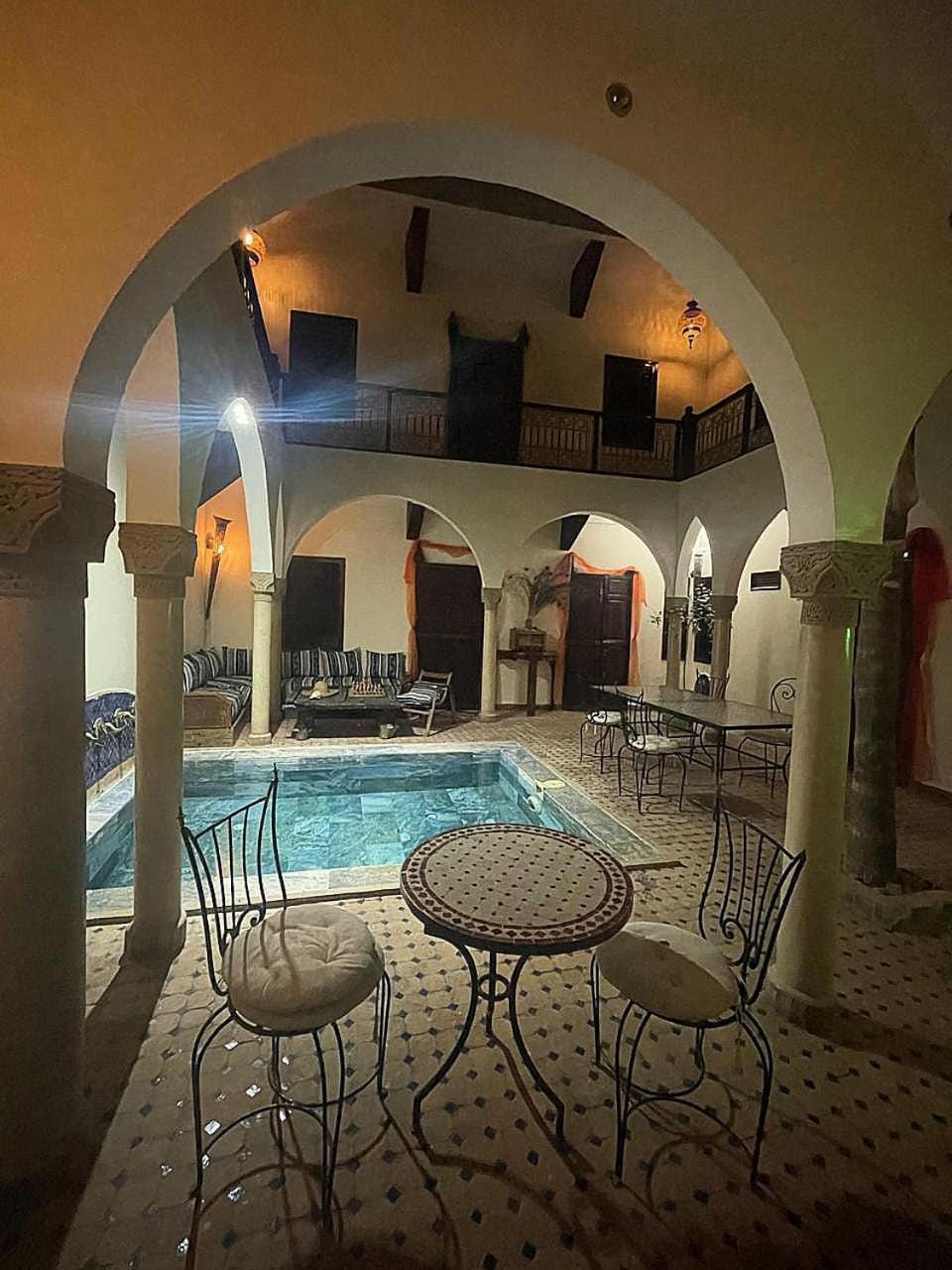 Patio, Living room, Seating area, Pool view, Swimming pool