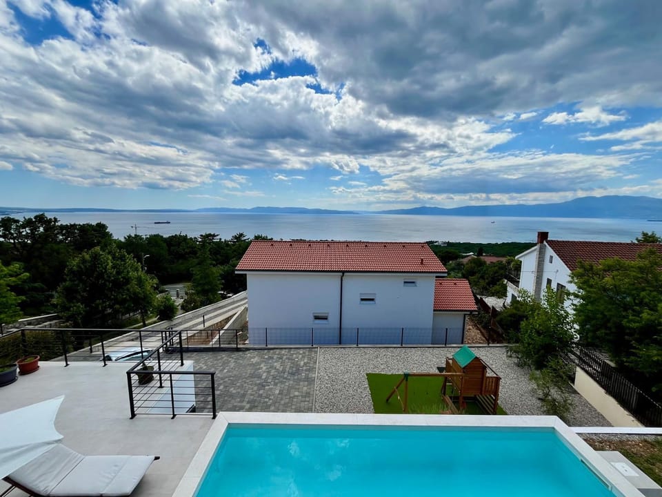 View (from property/room), Balcony/Terrace, Pool view, Sea view, Swimming pool